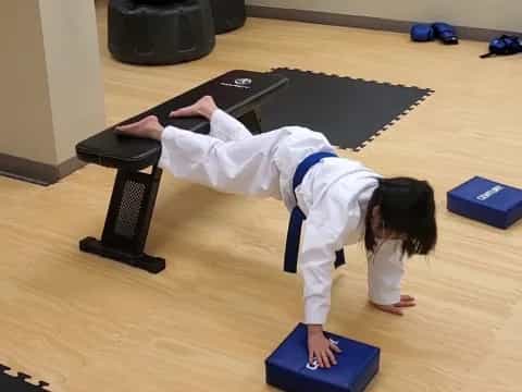 a person doing yoga on a mat