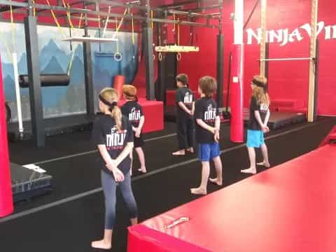 a group of children in a gym