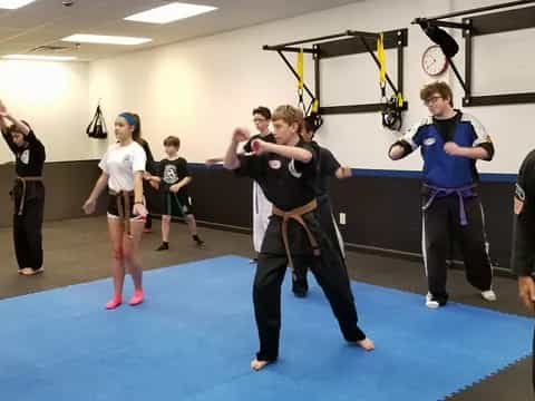 a group of people in a gym