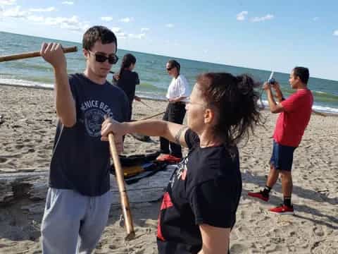 a group of people on a beach