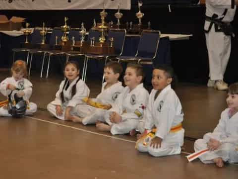 a group of children sitting on the floor