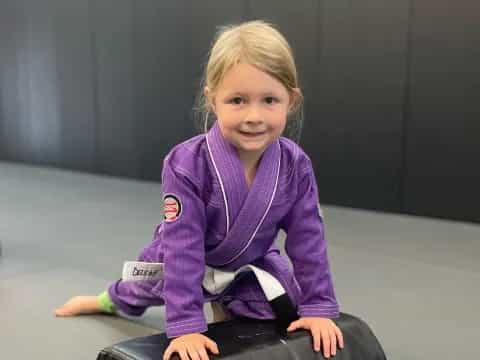 a girl sitting on the floor