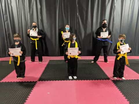 a group of people holding signs