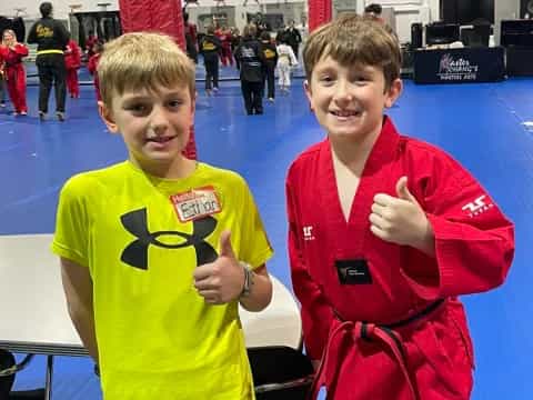 two boys posing for a picture