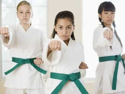 a group of women in white