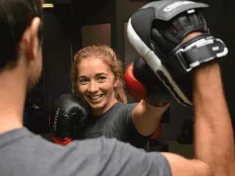 a man lifting another man