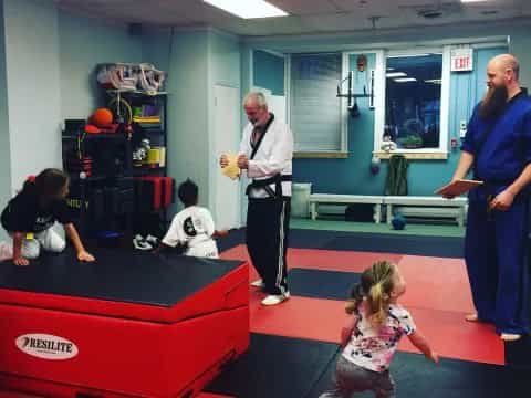 a man and a woman in a gym