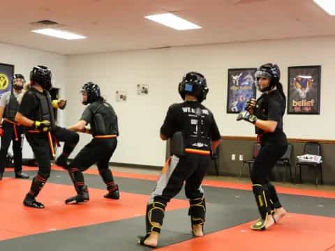 a group of people wearing helmets