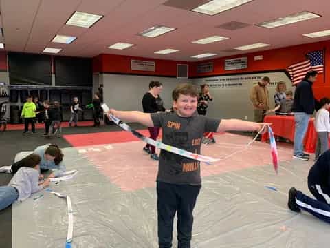 a boy holding a sword