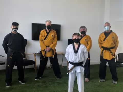 a group of people wearing masks