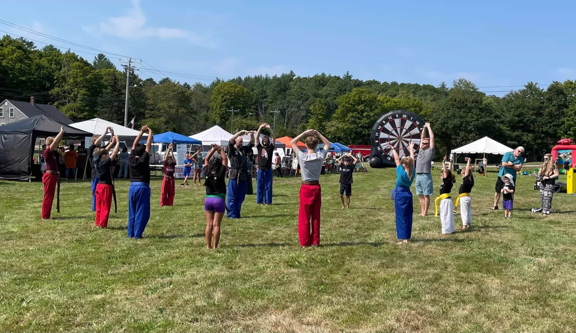 a group of people performing a dance