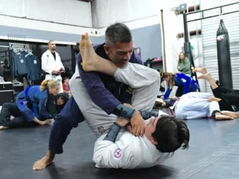 a group of people in a gym