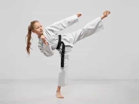 a person in a karate uniform