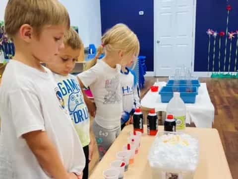a few children working at a table