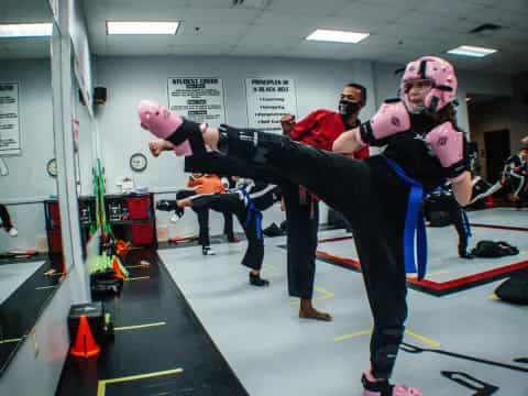 a group of people in a gym