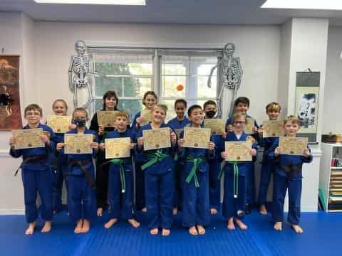 a group of children holding signs