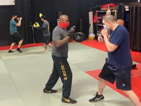 a group of people in a gym