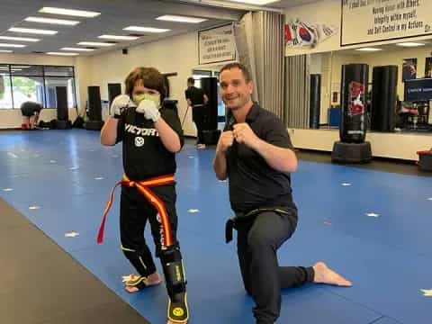 a man and a woman in a gym