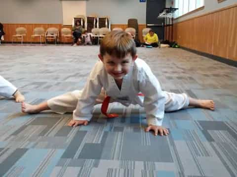 a boy lying on the floor