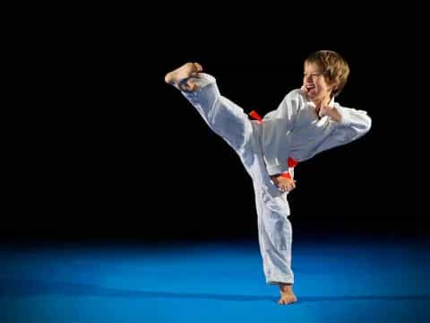 a man in a karate uniform