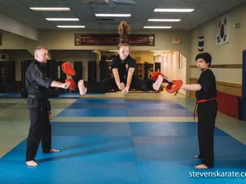 a group of people in a gym