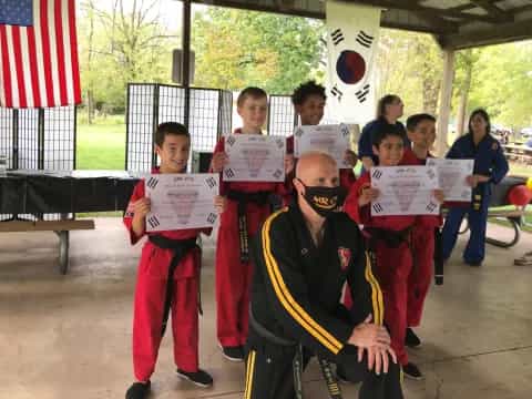 a group of people holding signs