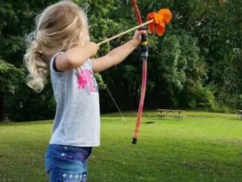 a girl flying a kite