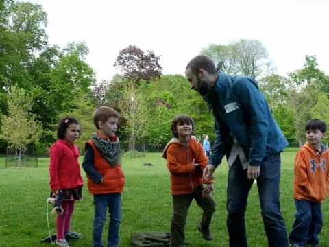 a person and a group of kids