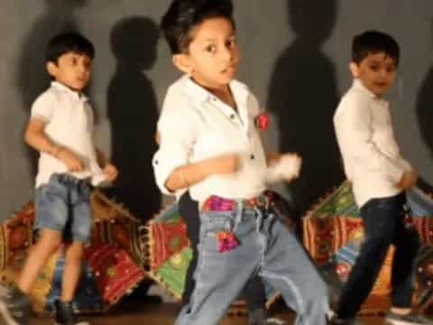 a group of children dancing