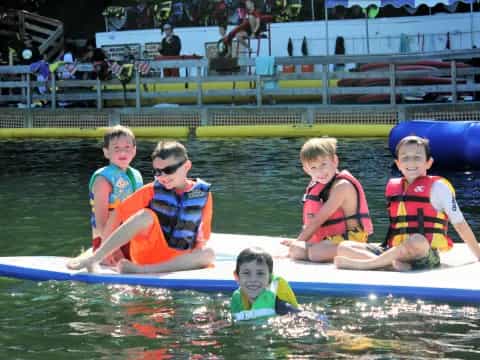 a group of people in a pool