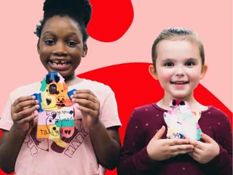 a couple of children holding toys