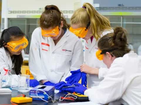 a group of people wearing masks