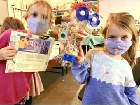 a group of children wearing masks