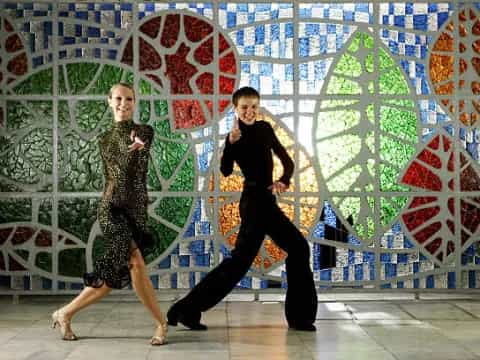 a man and woman dancing