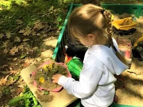 a girl holding a watermelon
