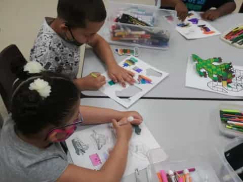 a group of people painting