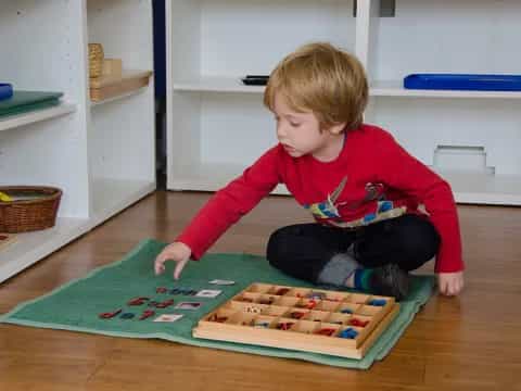 a child sitting on the floor