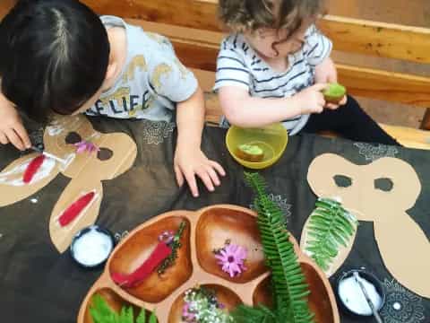 a group of kids eating food