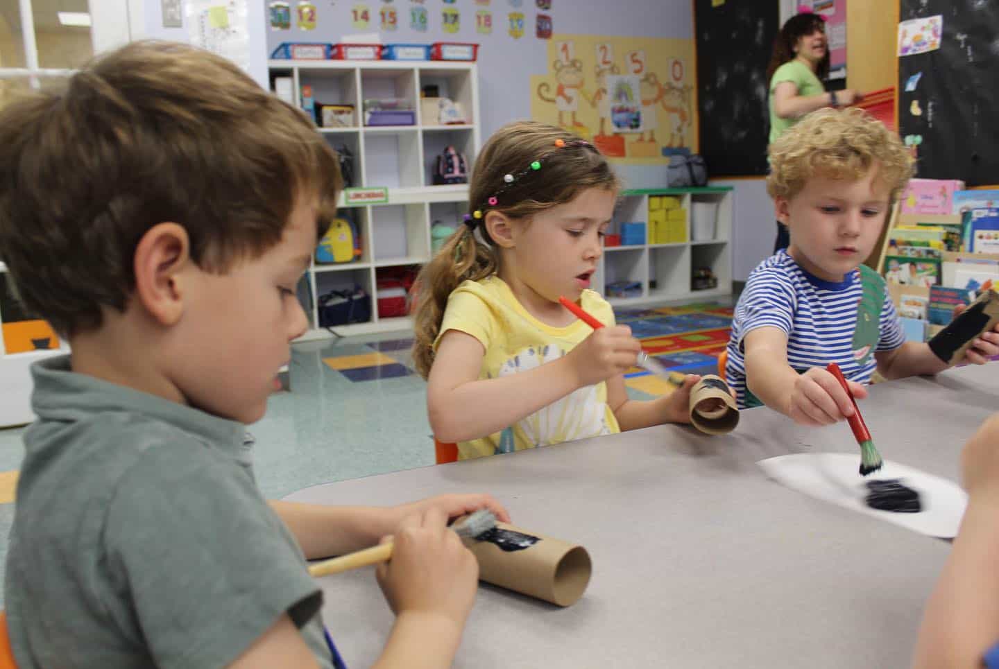 a group of children playing with a toy
