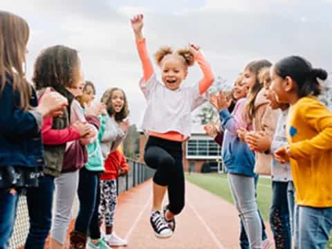 a group of children running