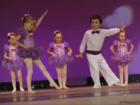 a group of children dancing