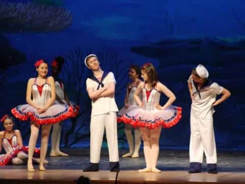 a group of people on a stage