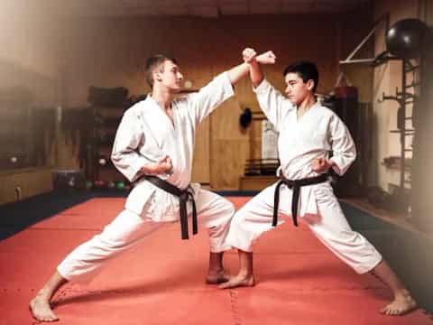 two men in karate uniforms