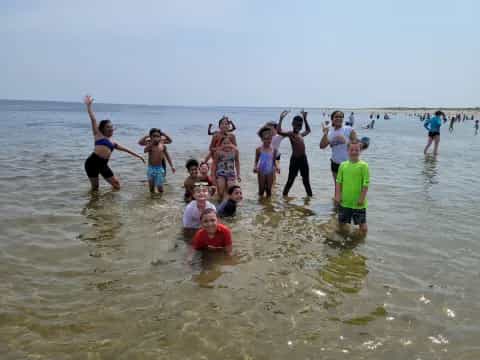 a group of people in the water