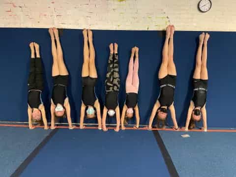 a group of women in a huddle