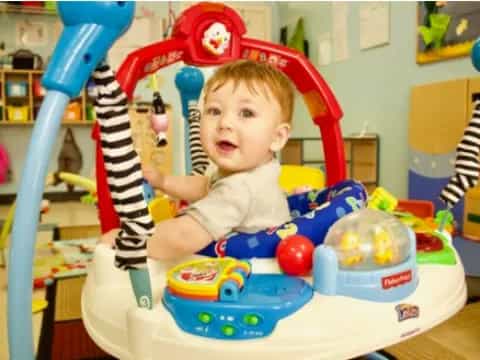 a baby in a highchair