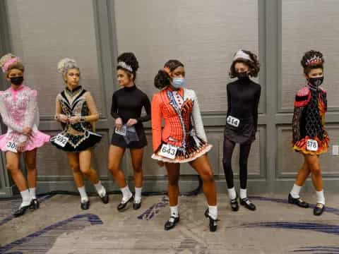 a group of women wearing clothing