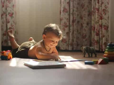 a child lying on the floor