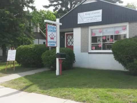 a building with a sign in front