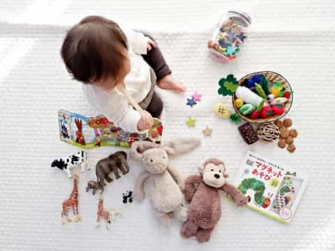 a baby playing with toys